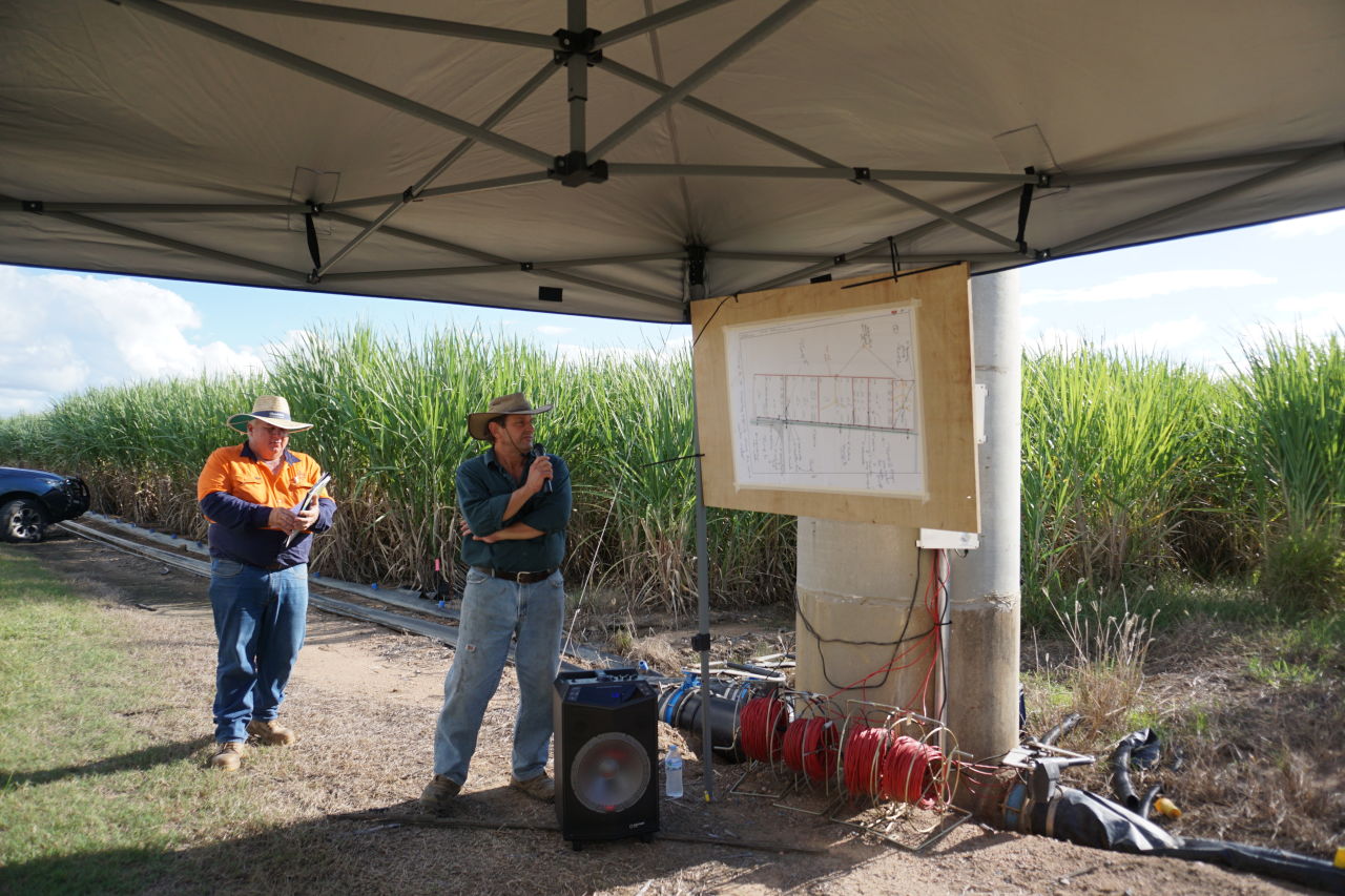 Terry Granshaw of Sugar Research Australia (left) and Steve Pilla (right) showcase the innovations they’ve made to automate irrigation across paddocks.