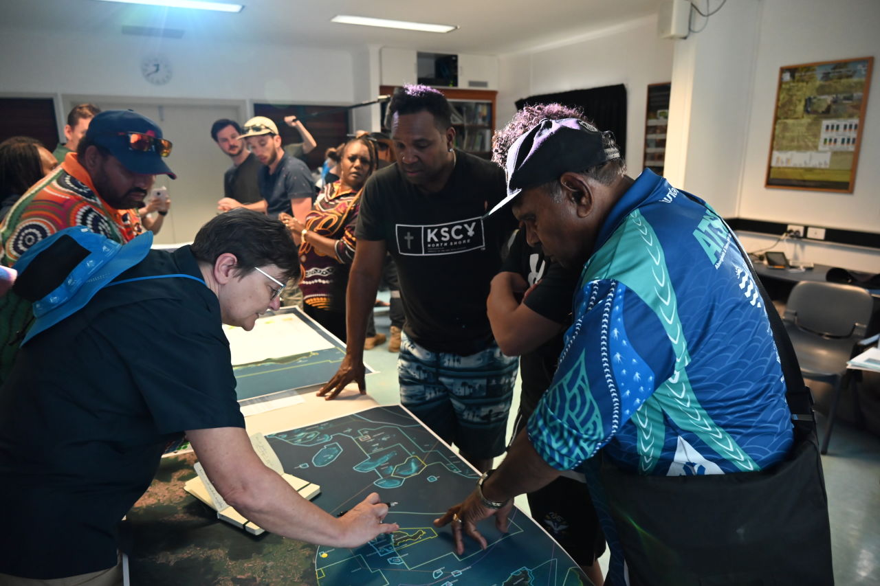 Manbarra Traditional Owners share their knowledge to help map monitoring sites. Credit: AIMS