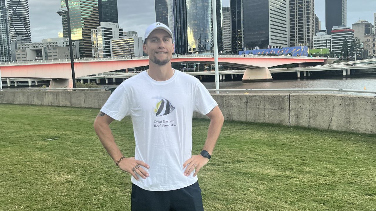 Tom runs first marathon for the Reef 