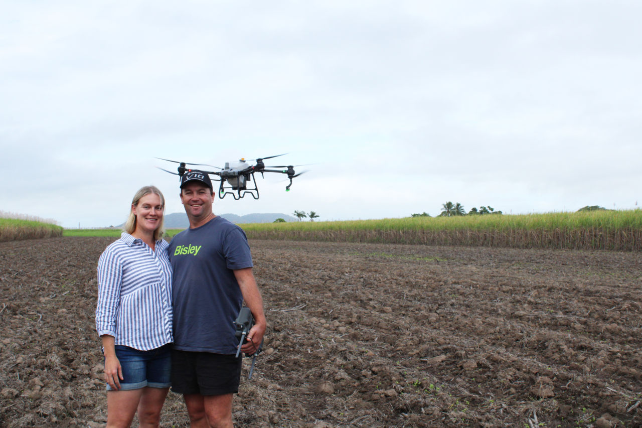 Kate and Clint Lyon use a drone for precision application of nutrients. Credit: CANEGROWERS Herbert River