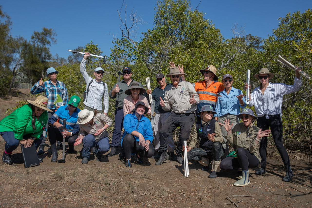 MangroveWatch volunteers celebrate after a day monitoring mangroves. Credit: Ben and Di