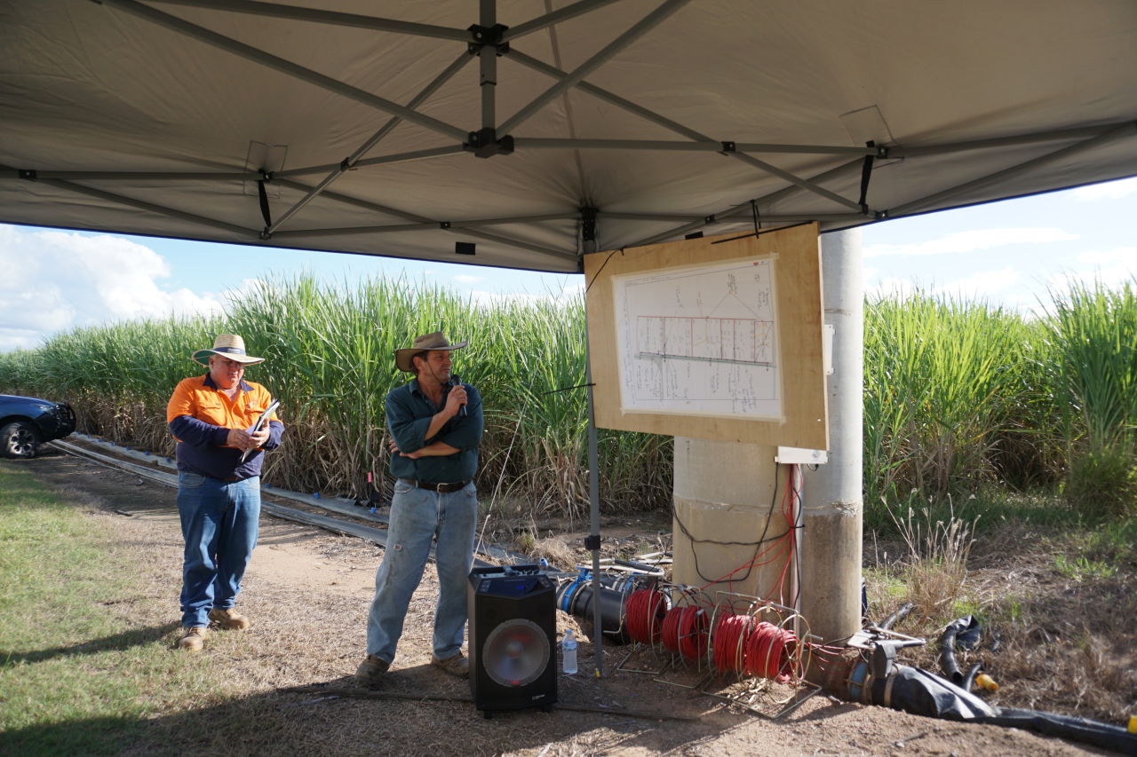 Terry Granshaw of Sugar Research Australia (left) and Steve Pilla (right) showcase the innovations they've made to automate irrigation across paddocks.