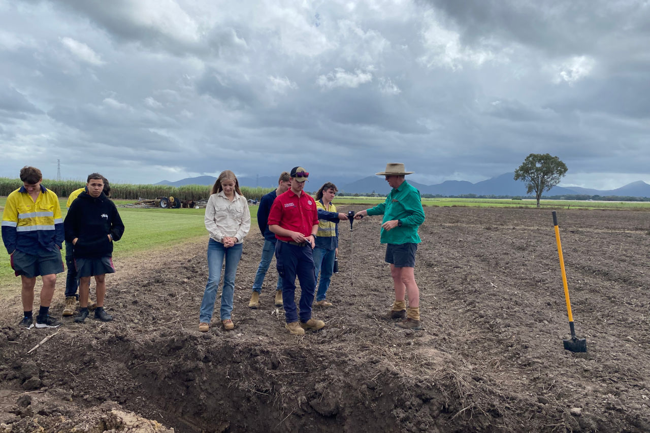 Students learn about soil health on the field tour with the Lower Herbert Water Quality Program. Credit: Canegrowers Herbert River