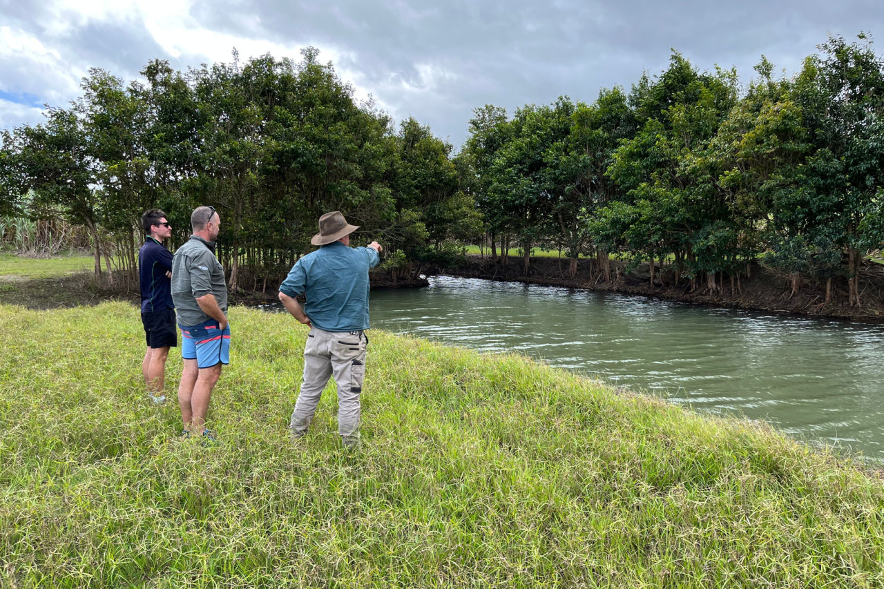 TropWATER staff and local canefarmers appraise potential controlled drainage interventions. Credit: JCU TropWATER