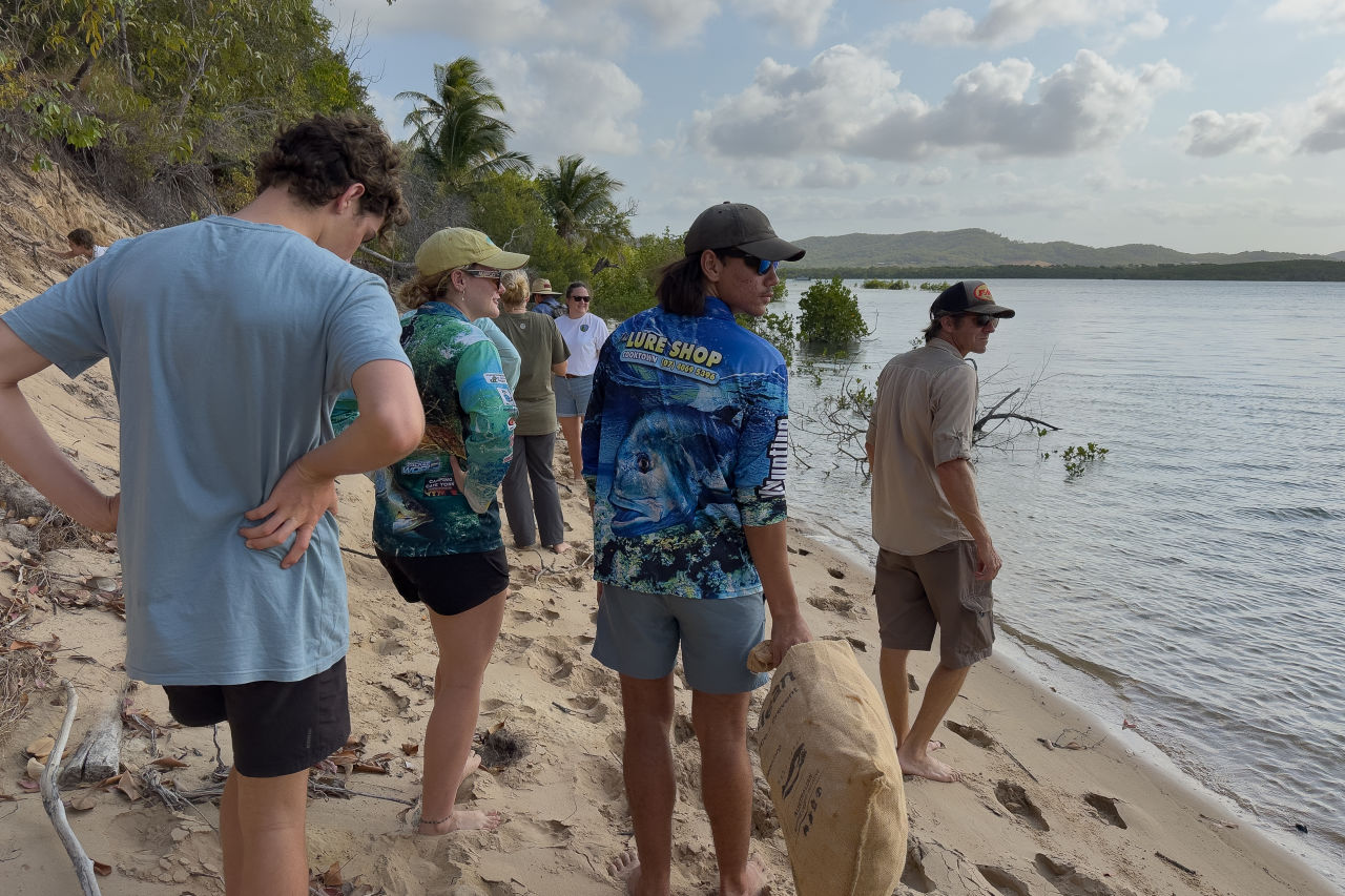 The team out on a beach clean. Credit: Ben and Di