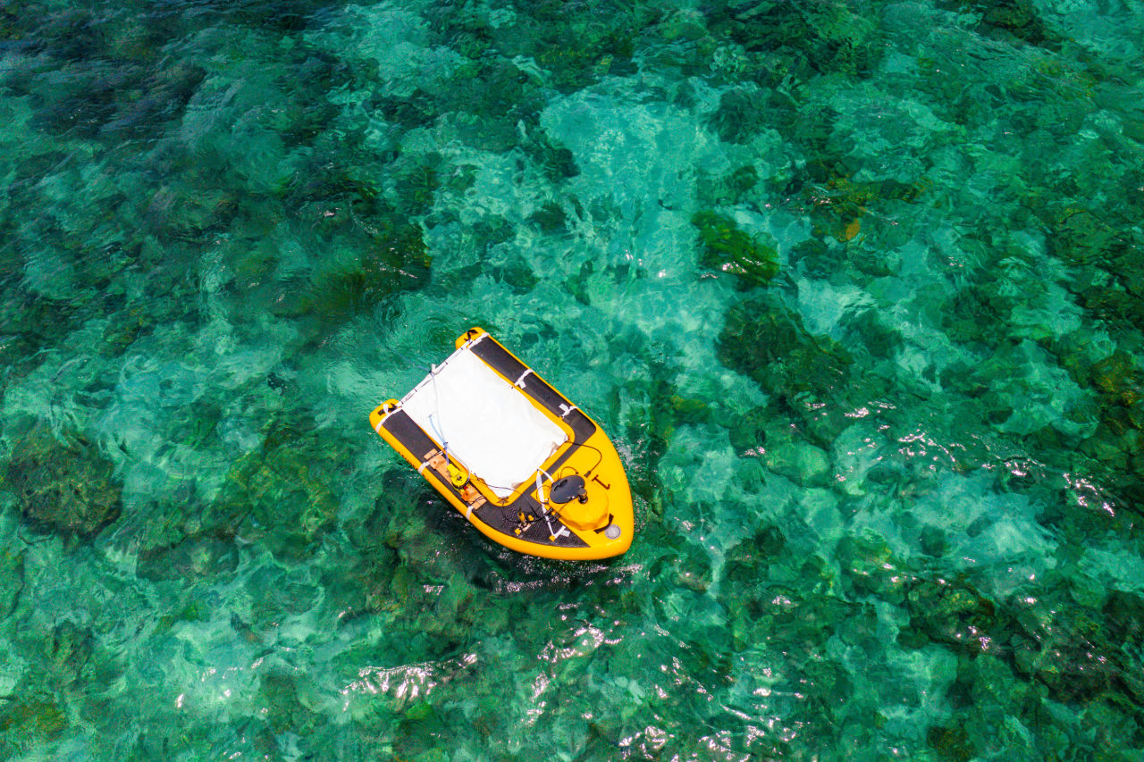 AI-enabled robots, dubbed LarvalBots and FloatyBoats (pictured above), were used to collect coral spawn and deploy larvae. Credit: Southern Cross University