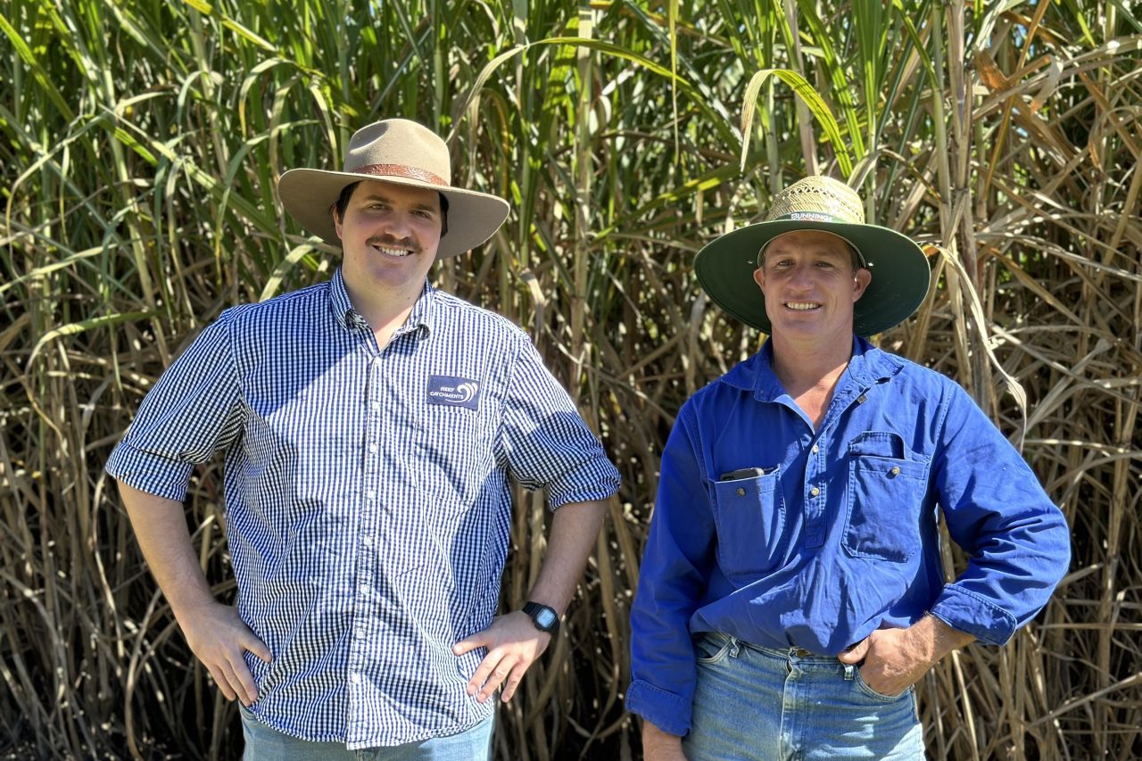 Todd McNeill with Grower Peter Doyle. Image CANEGROWERS Mackay
