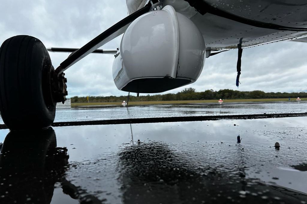 Cameras mounted to the plane help take photos while on survey. Credit: Cristophe Cleguer.