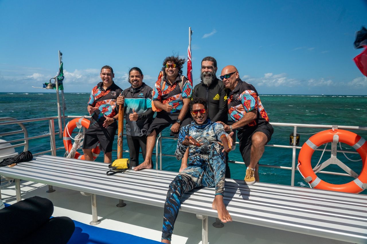 📷 Brad Fisher, Ikatere Photography - Members of the Kul-Bul project team and the Reef Restoration and Adaptation Science Traditional Owner Technical Working Group onboard Dreamtime Dive & Snorkel. 
