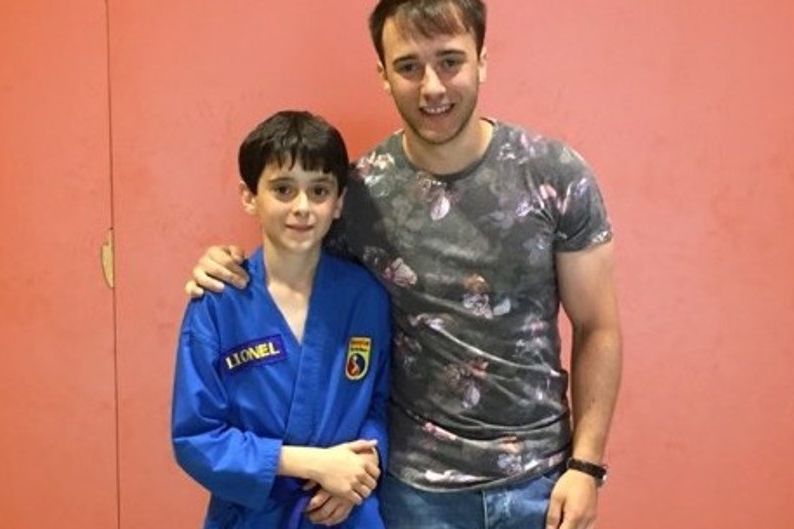 Loic with his cousin, Lionel who died tragically in a ski accident
