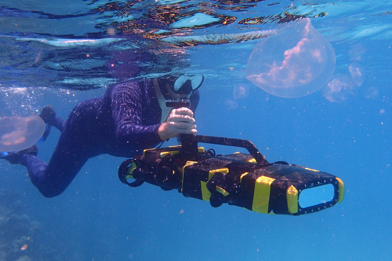 QUT's Dr Matt Dunbabin puts a RangerBot to the test on the Great Barrier Reef