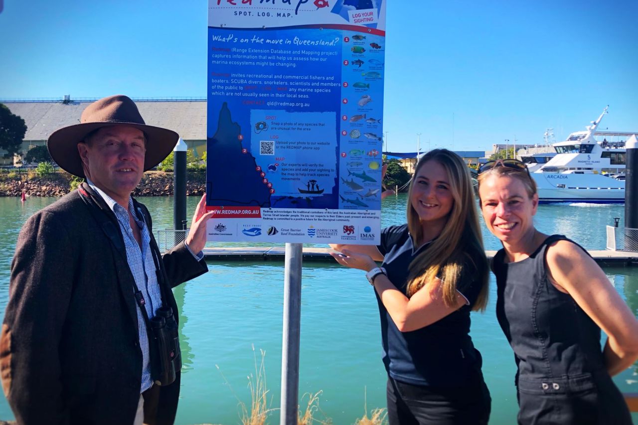 Redmap Team with Queensland Chief Scientists, Professor Hugh Possingham sharing the boat ramp signage. Credit: Redmap