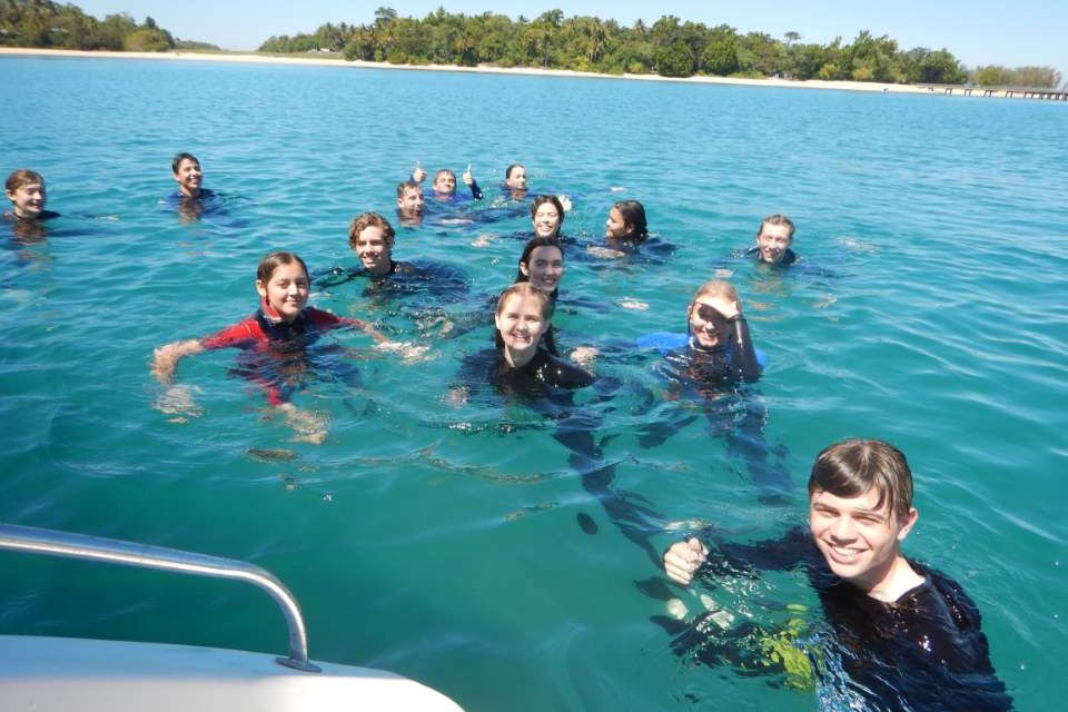 Students in the field practicing seagrass assessments. Credit: Science Under Sail.