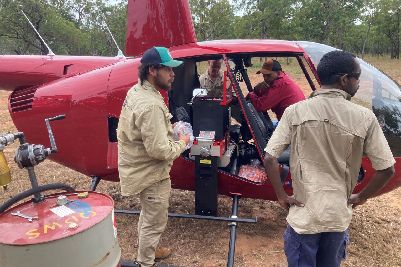 Preparing incendiary machine for strategic burning. Image South Cape York Catchments Inc