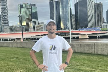 Tom runs first marathon for the Reef 